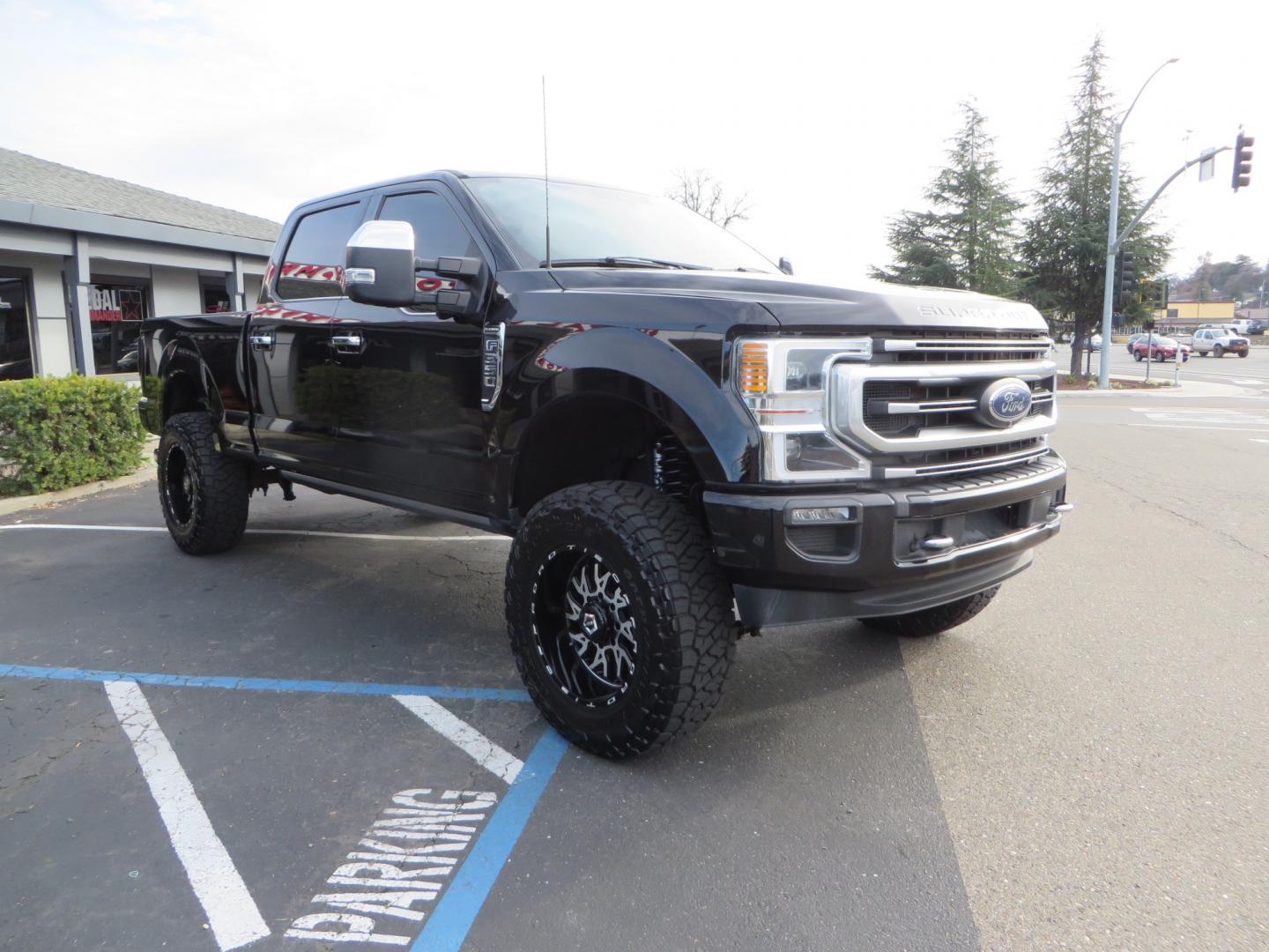 2021 BLACK /BLACK Ford F-350 SD Platinum Crew Cab Short Bed 4WD (1FT8W3BT4ME) with an 6.7L V8 OHV 16V DIESEL engine, located at 2630 Grass Valley Highway, Auburn, CA, 95603, (530) 508-5100, 38.937893, -121.095482 - Photo#2